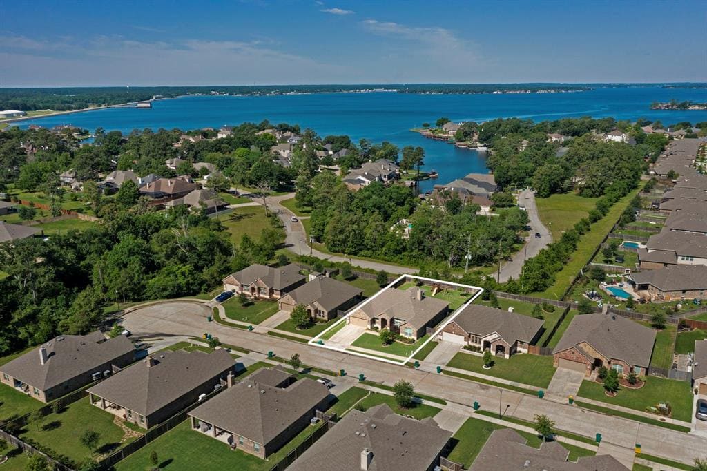 Lake Conroe Texas neighborhood aerial — Grand Central Park vs Ladera