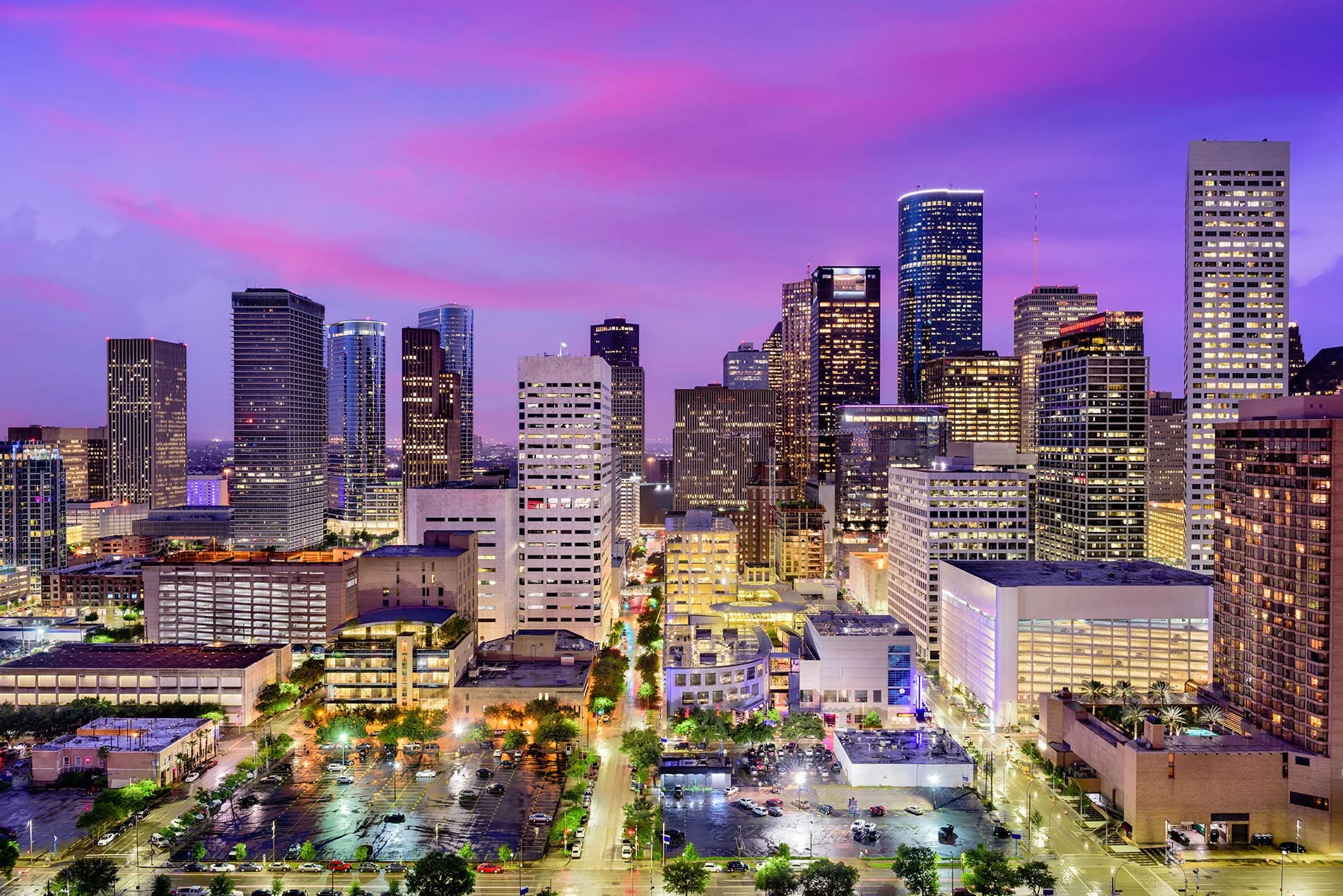 Houston Texas skyline at night — Houston real estate forecast 2026 interest rate stability
